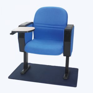 A blue chair with a tray on the arm rest.